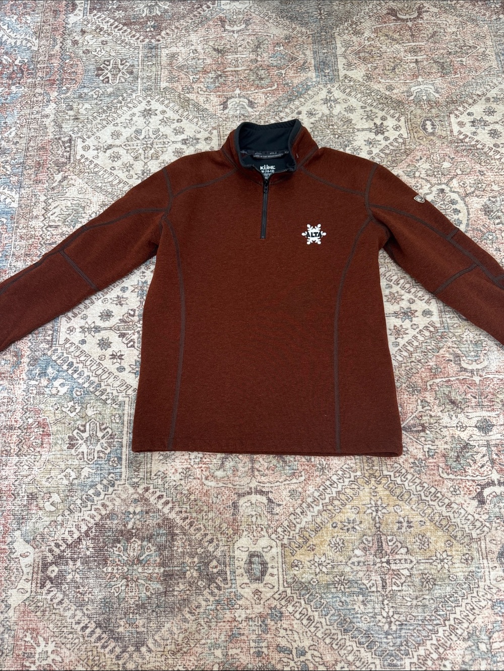 Kuhl Kid’s Zip-Neck Sweater in Brick Brown with Alta logo